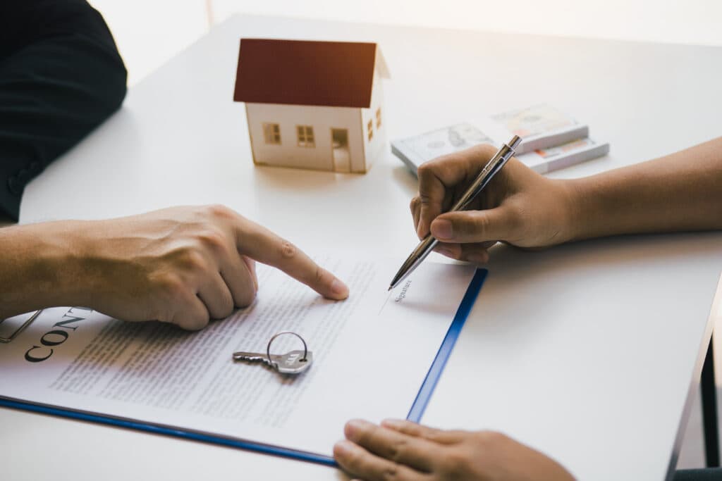 Landlord and tenant signing a contract